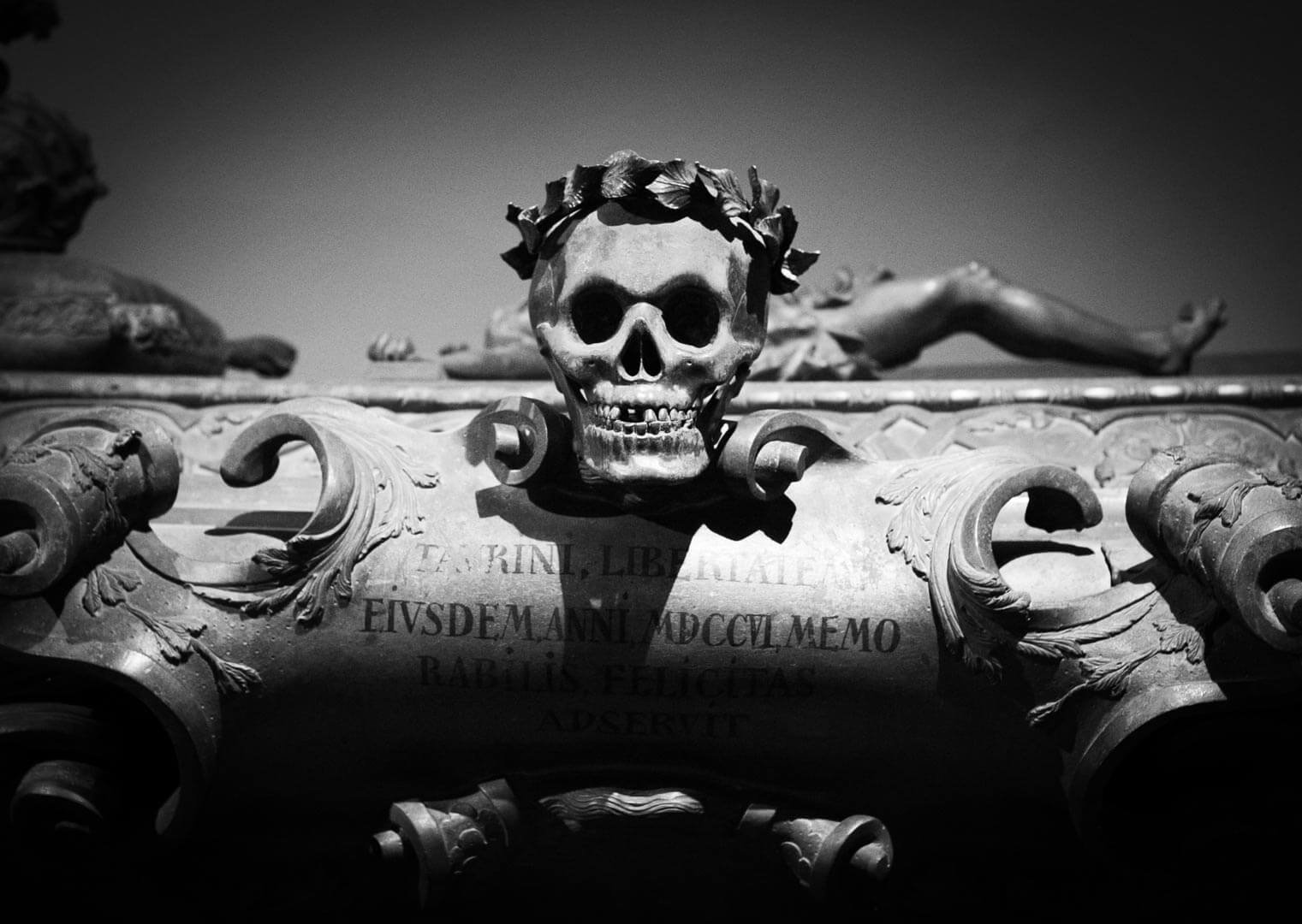 Skull monument atop a Habsburg tomb inside Vienna's Imperial Crypt (Kapuzinergruft)