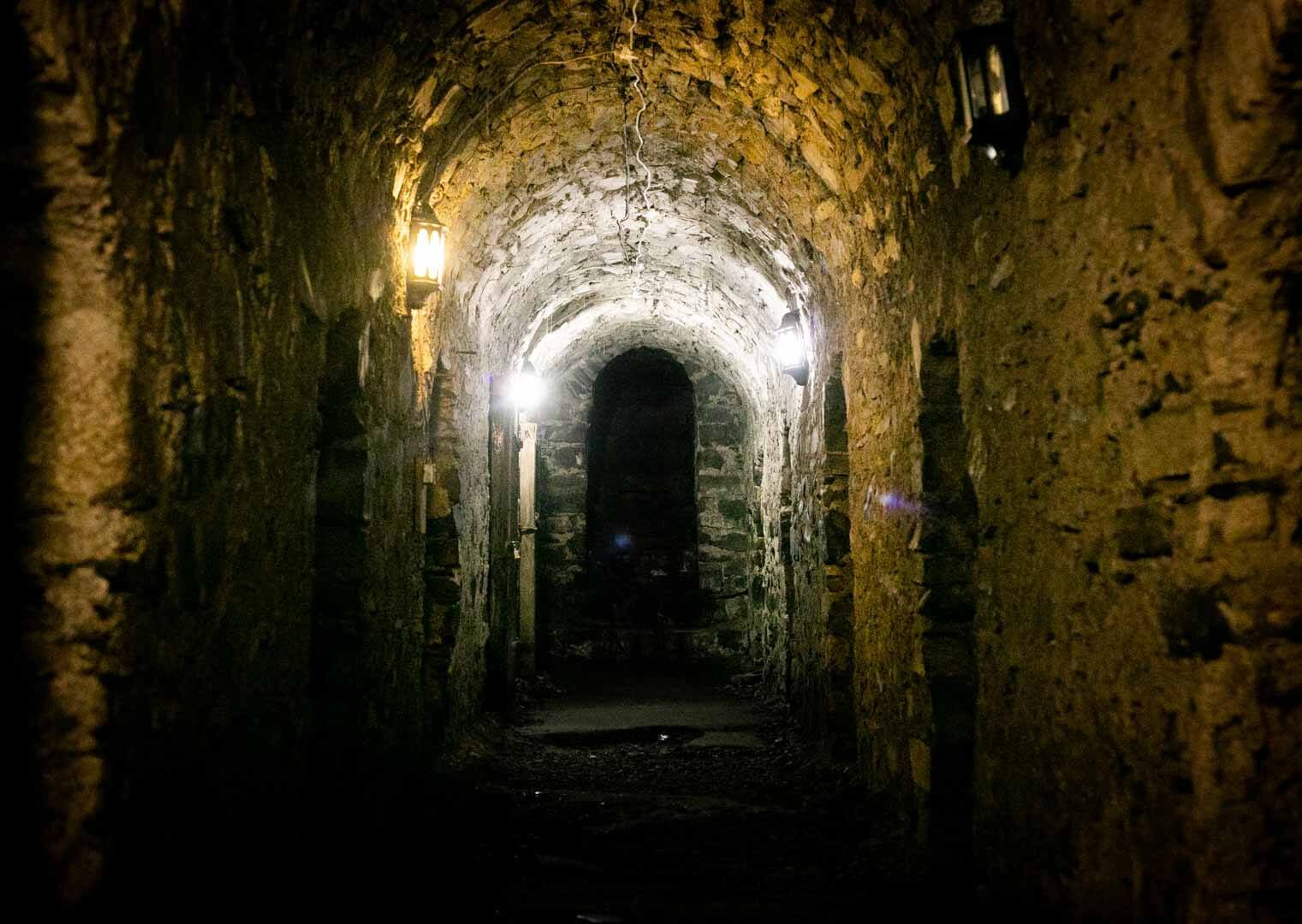 Atmospheric hallway inside St Michan's Church Crypt in Dublin, associated with vampire legends, Bram Stoker, Dracula inspiration, and dark tourism.